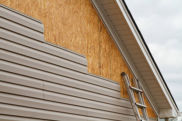 Professional Siding Contractor technician working in Lake City, GA